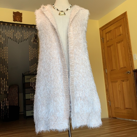 Sweaters - Women’s soft pink shag fur vest with hood.